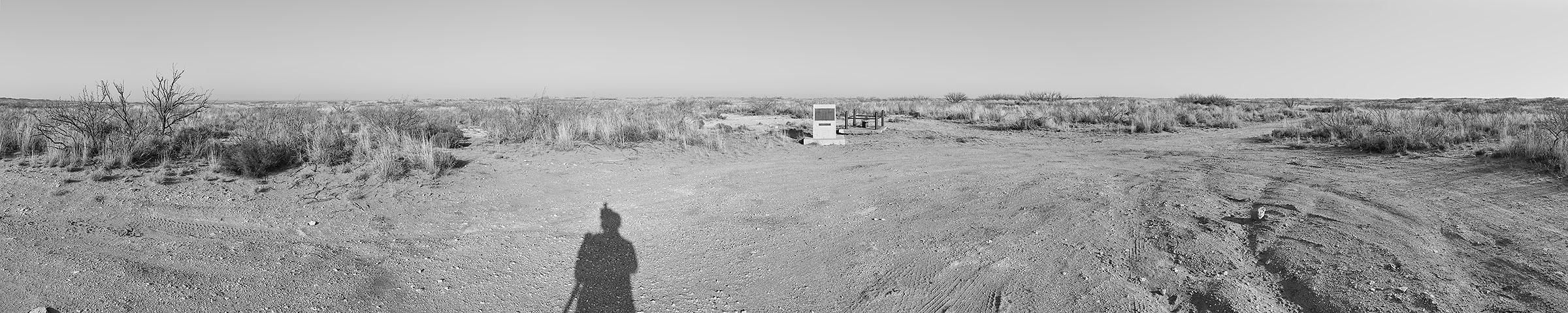 Project Gnome nuclear test site, New Mexico — panoramic photograph by Peter Voigt, with the photographer's shadow in the foreground.