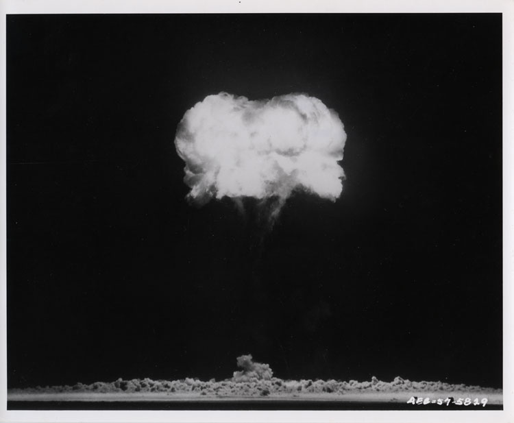 Mushroom cloud of Shot Doppler, 13th atomic test of Operation Plumbbob, immediately after detonation from a balloon at 1,500 feet, Nevada Test Site, 23 August 1957. LASL gas-boosted implosion device, 11 kt. Lookout Mountain Laboratory, USAF. AEC-57-5829.