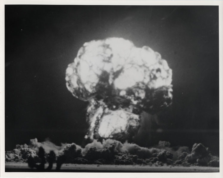 Mushroom cloud of Shot Apple-2, 13th nuclear test of Operation Teapot, 152-metre tower detonation, Area 1, Yucca Flat, Nevada Test Site, 5 May 1955. LASL Class D thermonuclear device, 29 kt. Operation Cue civil defence test. Joint Office of Test Information. AEC-55-5208.
