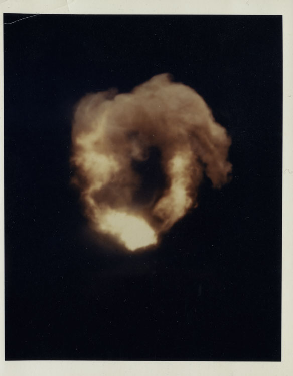 Color photograph of the fireball of Shot John, ninth nuclear detonation of Operation Plumbbob, AIR-2A Genie rocket detonation at 5,639 metres, Area 10, Nevada Test Site, 19 July 1957. W-25 warhead proof test, 1.7 kt.