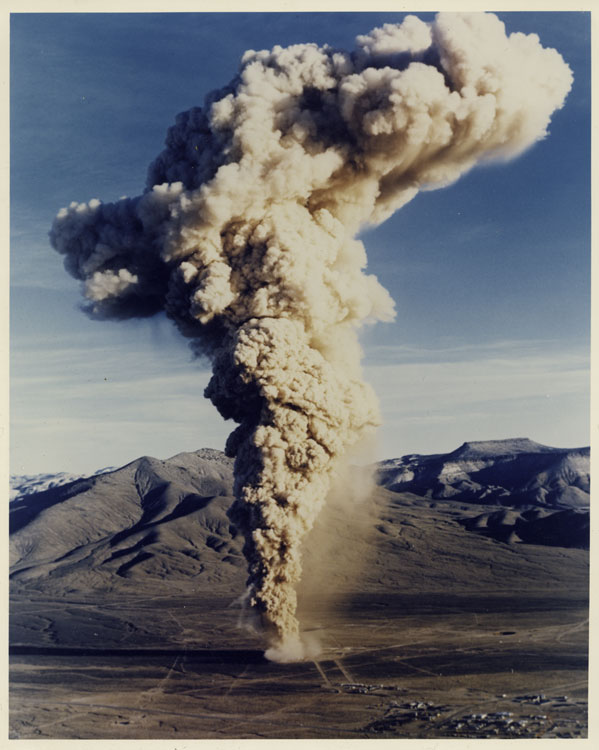 Color photograph of the venting cloud of Shot Baneberry, Operation Emery, underground nuclear test at 274 metres depth, Area 8, Yucca Flat, Nevada Test Site, 18 December 1970. 666th US nuclear test. 10 kt. Accidental vent exposed 86 workers to radioactive fallout.