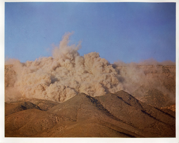 Color dye transfer photograph of the venting cloud of Shot Logan, 16th nuclear detonation of Operation Hardtack II, tunnel shot at 284 metres depth, Area 12, Rainier Mesa, Nevada Test Site, 16 October 1958. UCRL ABM warhead development test, 5 kt. Colorage Inc., Burbank, California, File No. 98-80. AEC official photography, declassified.