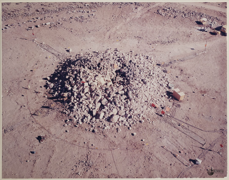Project Sulky, Plowshare Program — nuclear cratering experiment, device buried 27 metres in basalt, Nevada Test Site (Area 18, Buckboard Mesa), 18 December 1964; yield about 85 tonnes of TNT equivalent, producing a "retarc" mound. Credit: U.S. Atomic Energy Commission (Division of Peaceful Nuclear Explosives).