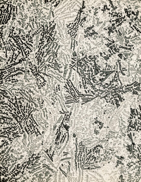 Photomicrograph of a uranium-3% silicon alloy thin section at 500x magnification, showing crystalline grain structure. Eldorado Nuclear Limited Metallographic Laboratory, 1968.