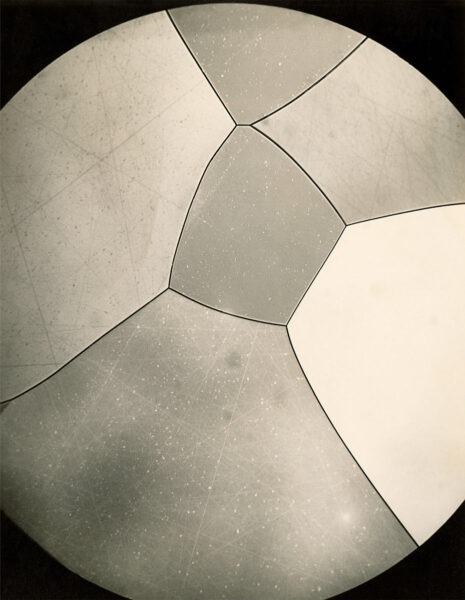 Photomicrograph of a uranium alloy thin section (Heat 519) at 250x magnification, showing crystalline grain structure. Eldorado Nuclear Limited Metallographic Laboratory, 1968.